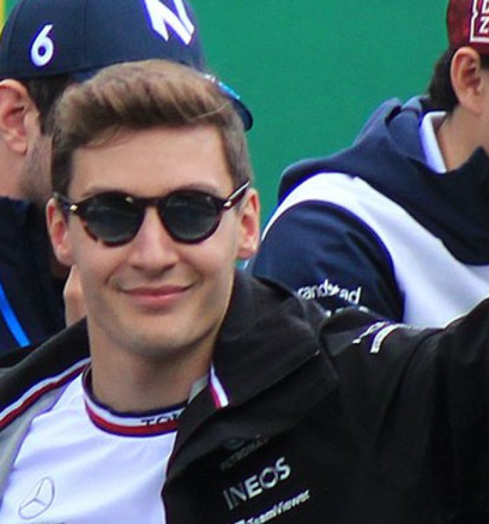 Russell Outfoxes Rivals to Win from Hamilton